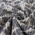 Tissu tricot gaufré brossé imprimé léopard